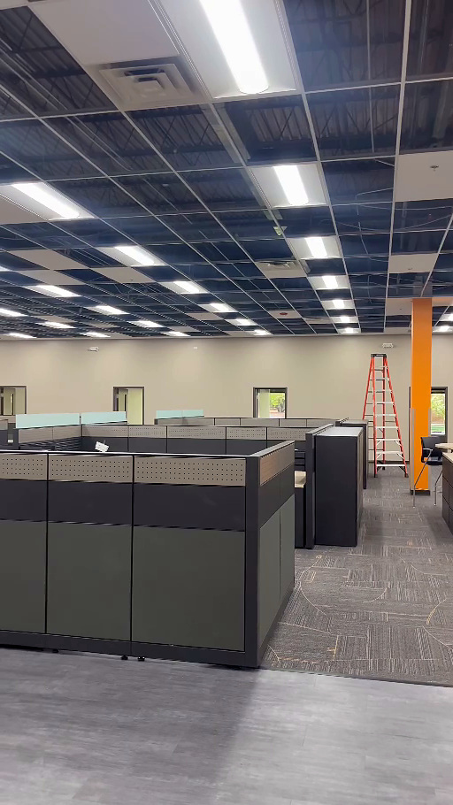 LED ceiling lighting above the new office workstations at Crown Lift Trucks.