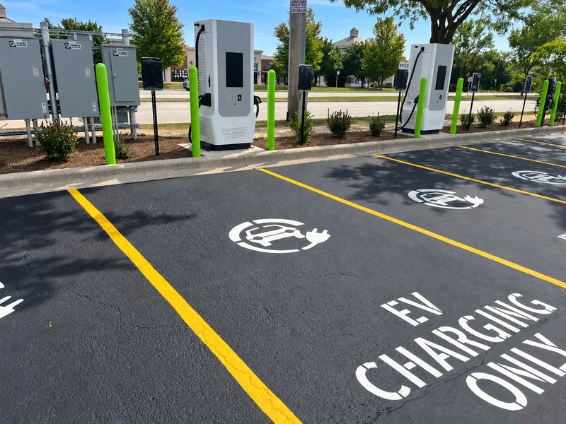 EV chargers, protective bollards and finished charging spaces in Naperville.