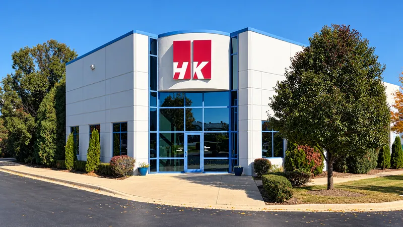 HK Laser & Systems building exterior and HK sign in Bartlett, Illinois