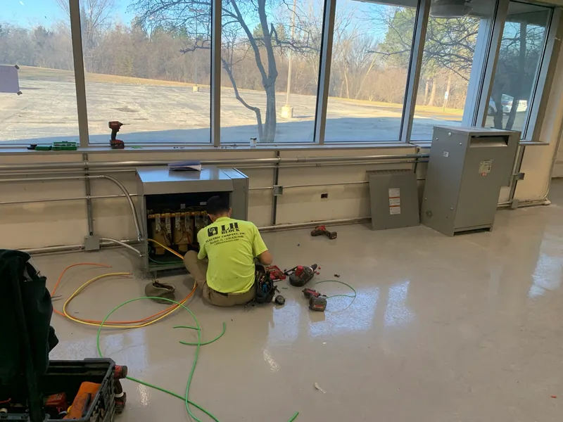 LH Block electrician completing transformer wiring in preparation for relocated manufacturing equipment.