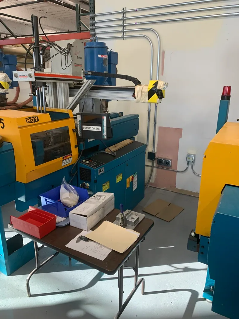 Conduit and equipment power connections serving injection molding machinery.