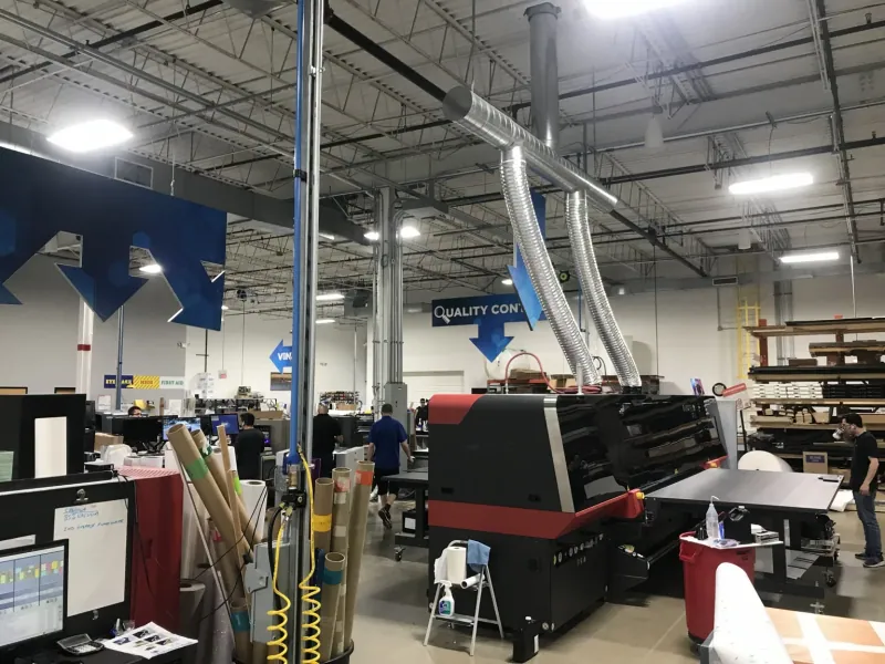 Large-format printing equipment on the ER2 production floor
