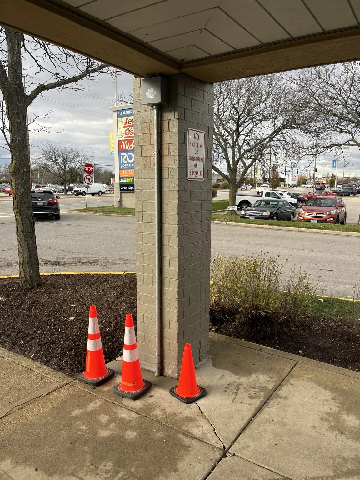 Completed surface-mounted conduit and junction box at the shopping center.